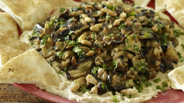 Layered Hummus and Eggplant with Roasted Garlic and Pine Nuts