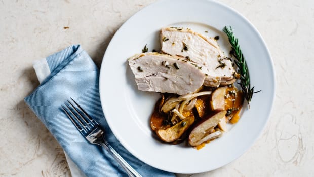 ROASTED SAGE AND ROSEMARY TURKEY WITH SWEET POTATOES AND APPLES