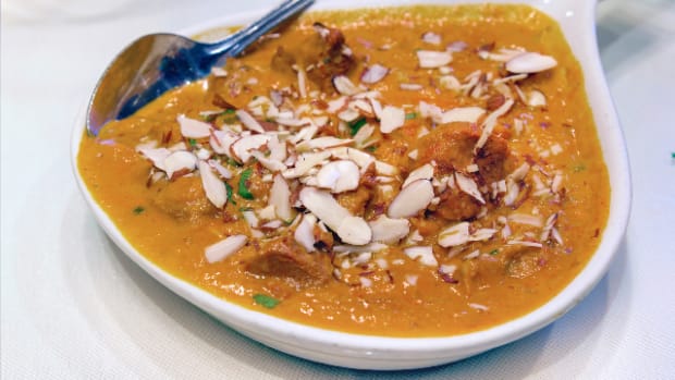 Beef Curry Korma with Sliced Almonds Closeup