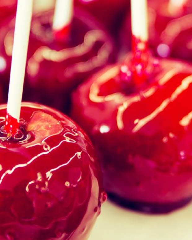 Red Candied Apples on White Sticks