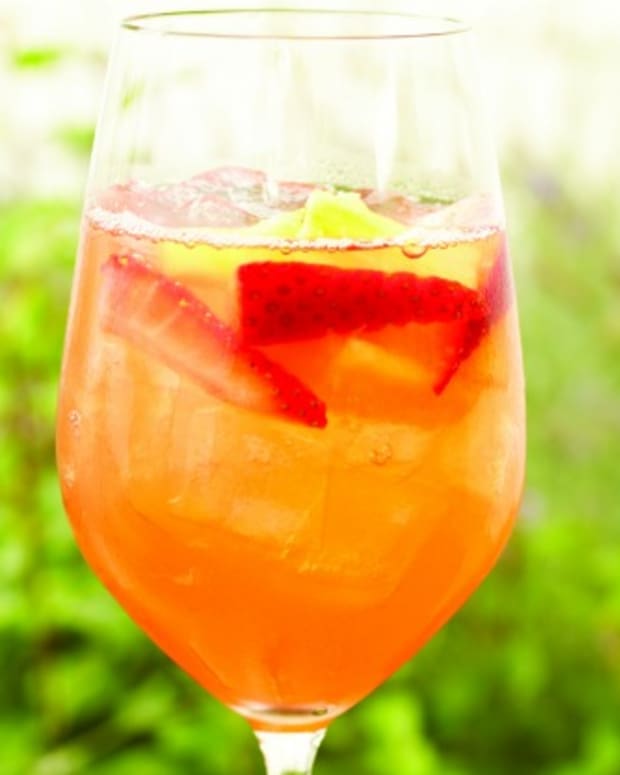 Sangria with strawberry tequila, fresh pineapple juice, and dry rose wine