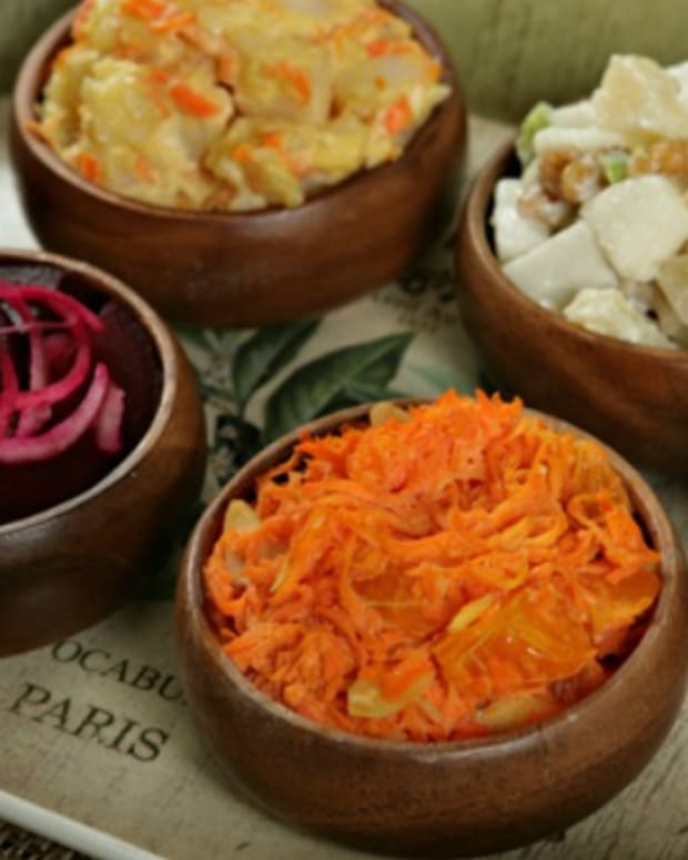 Mayonnaise, waldorf salad, red potato salad, eggplant babaganoush + orange carrot salad