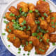 SRIRACHA HONEY CHICKEN POPPERS