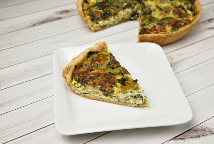 Caramelized Onion, Spinach and Blue Marble Quiche - Jamie Geller