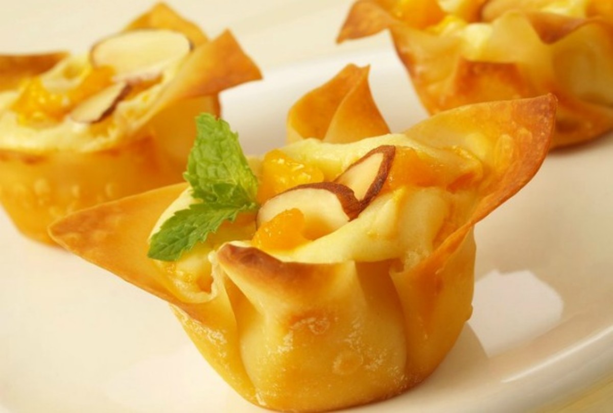 Mini Mango Amaretto Cheesecakes
