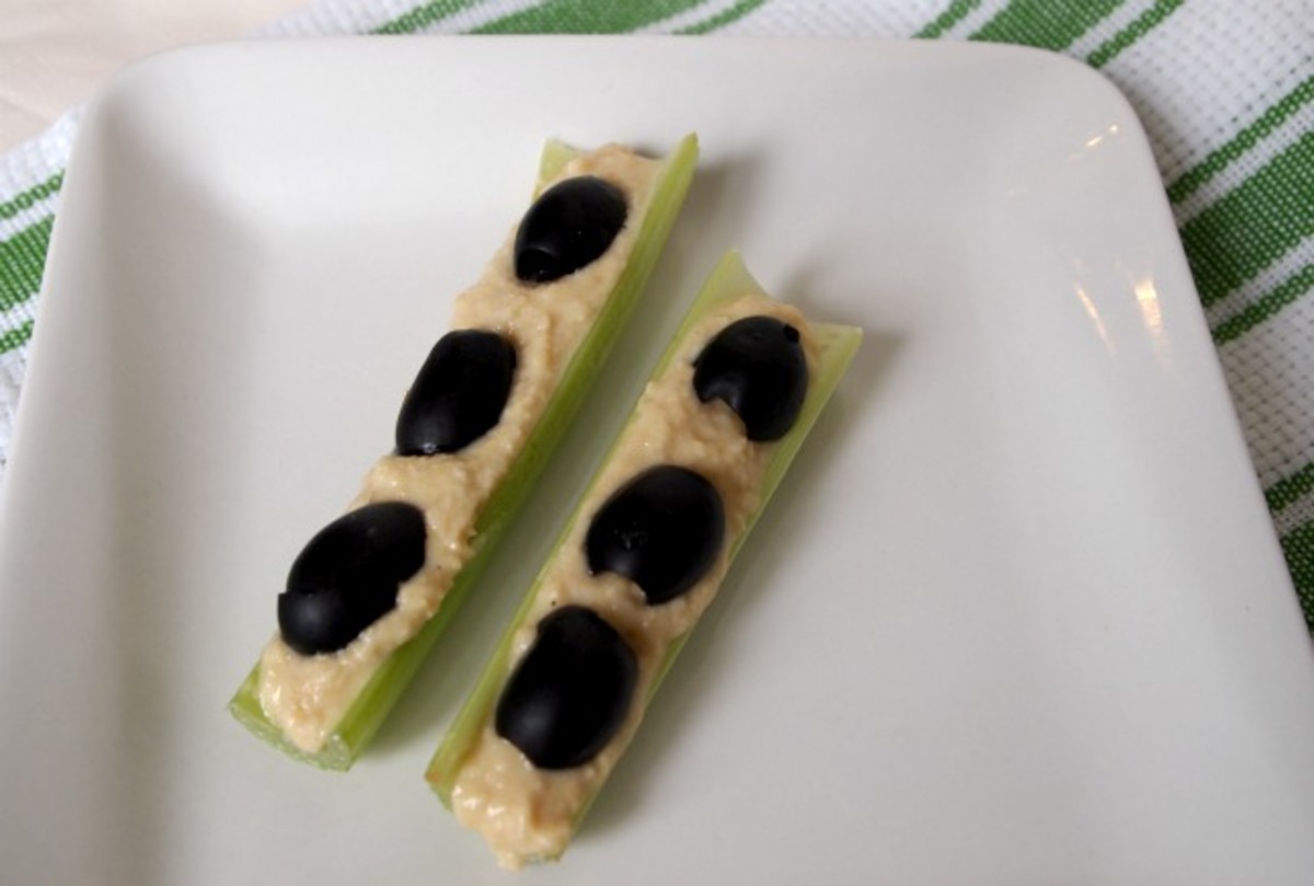 Ants on a Log with Hummus and Olives