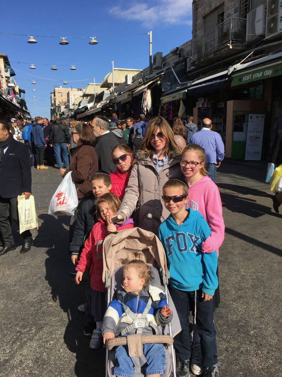 Jamie geller and the family at the shuk