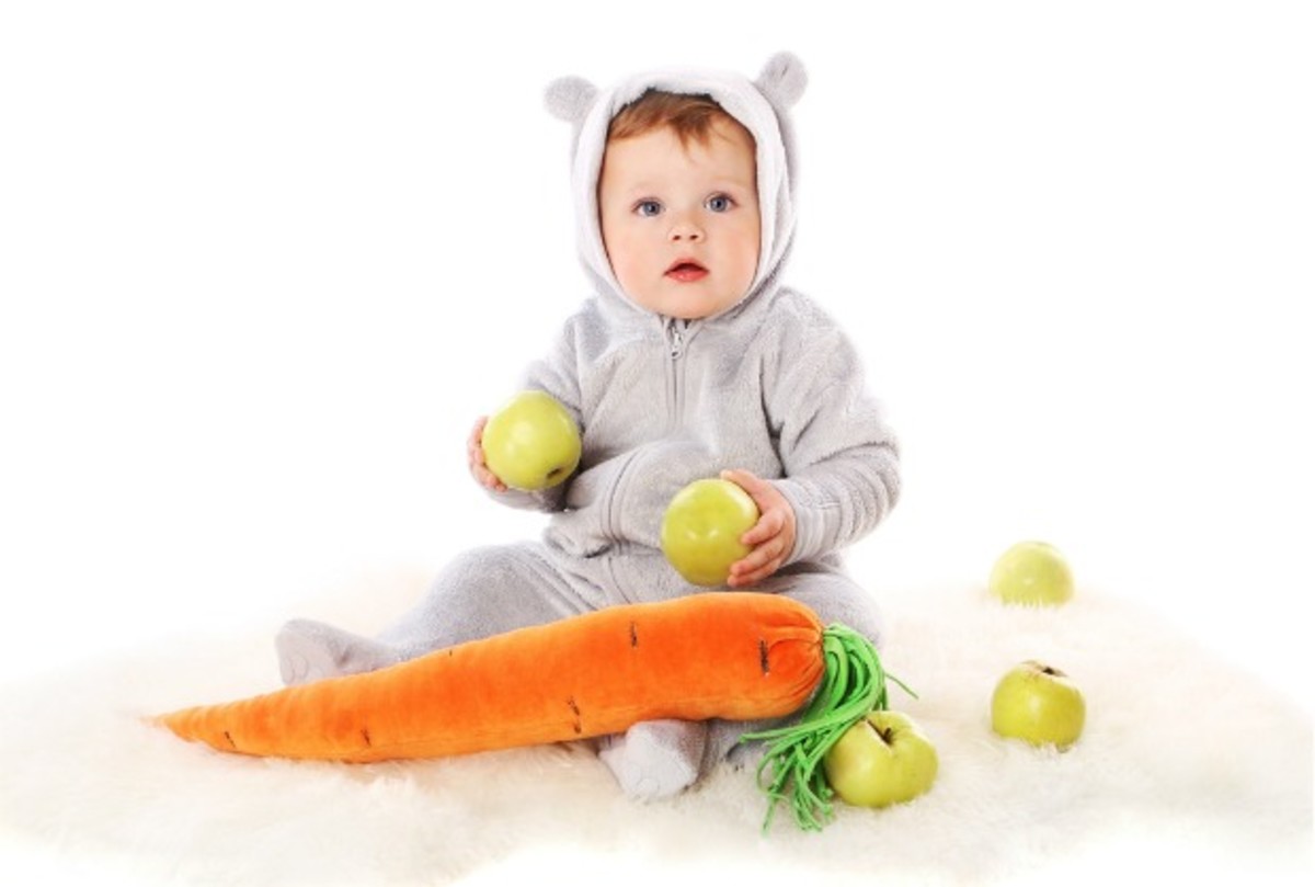 kid in costume with carrot
