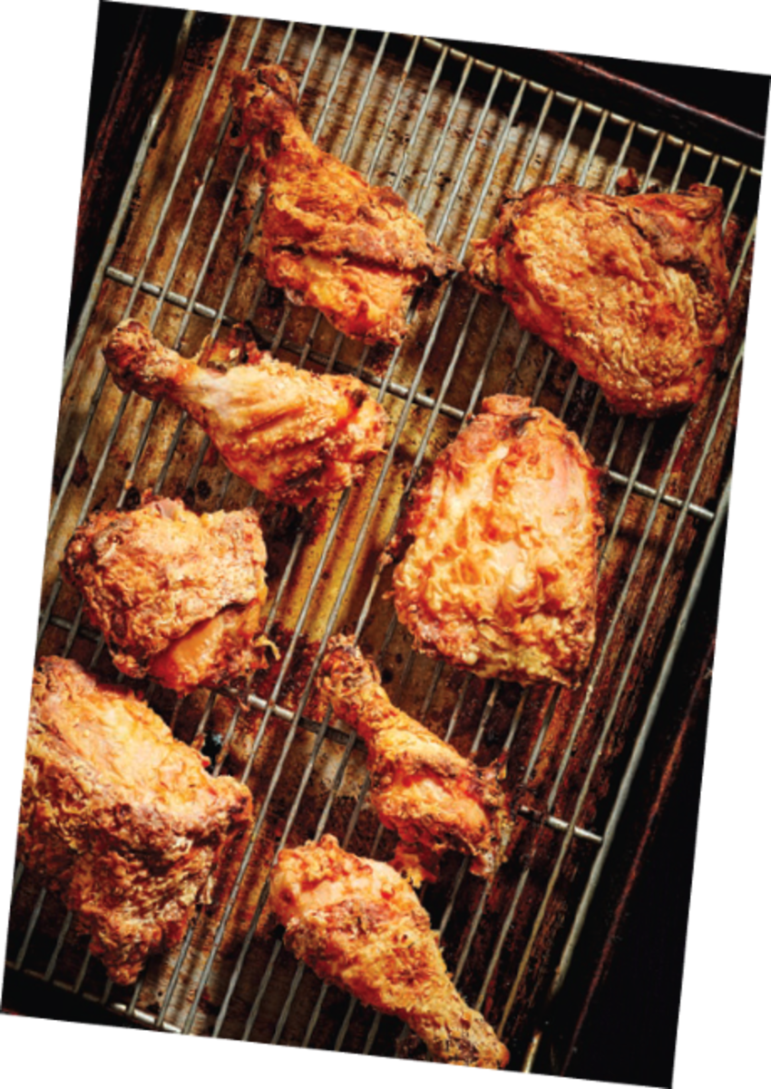 Oven fried chicken on rack