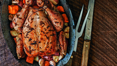 Apple-Stuffed Rosemary Roast Chicken with New Potatoes