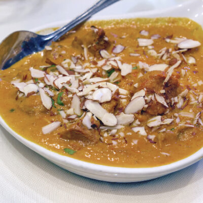 Beef Curry Korma with Sliced Almonds Closeup