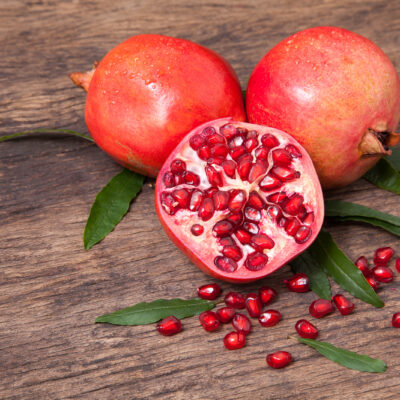 bigstock-Fresh-Pomegranate-Fruit-And-Po-148786013.jpg