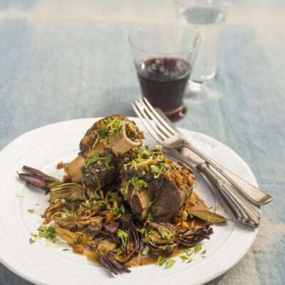 BRAISED LAMB SHANKS WITH CRISPED ARTICHOKES AND GREMOLATA