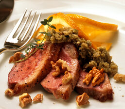Charlie Palmer&rsquo;s Seared Duck with Roasted Walnuts and Green Olive Tapenade