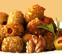 Charlie Palmer&rsquo;s Walnut Coated Crisp Olives