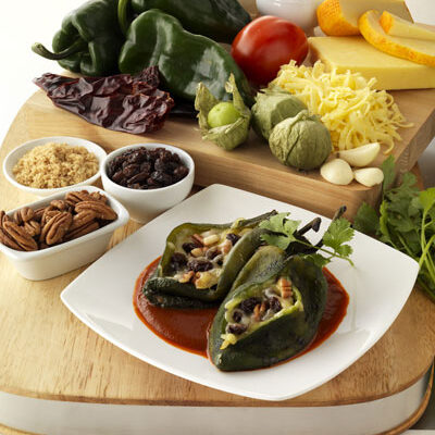 Chile Rellenos with California Raisins, Cheese, Pecans and Guajillo Chile Sauce