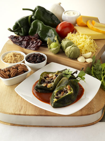 Chile Rellenos with California Raisins, Cheese, Pecans and Guajillo Chile Sauce