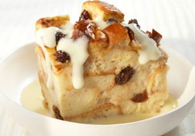 Cinnamon Raisin Bread Pudding with Vanilla Pudding Sauce