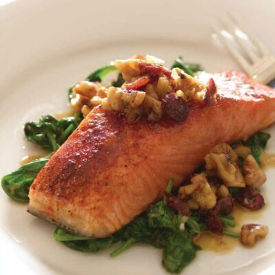 cranberry walnut salmon on a bed of spinach (99)