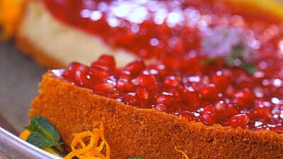 Creamy Cheesecake with Pomegranate Topping
