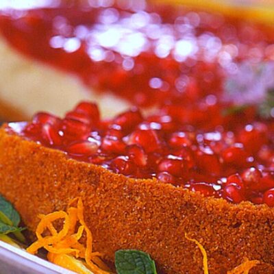 Creamy Cheesecake with Pomegranate Topping