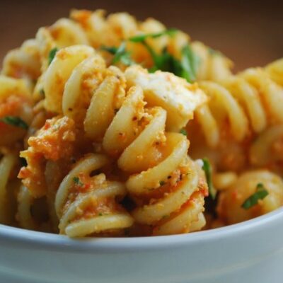 fusilli with goat cheese, red peppers and basil