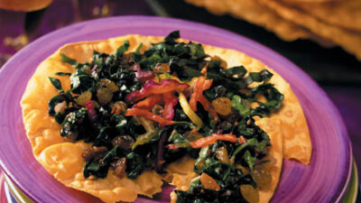 Garlic-California Raisin Wilted Greens on Pappadum (Saag Pappadum)