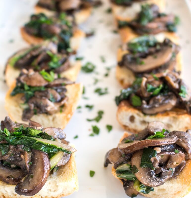WILTED GREENS AND SAUTÉED MUSHROOM CROSTINI