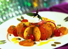 Grilled Idaho&reg; Potato Salad with Warm Goat Cheese and a Yellow Tomato Vinaigrette