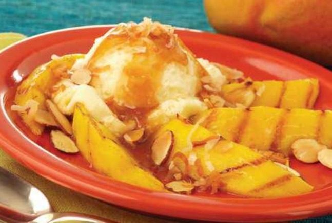 Grilled Mango with Spicy Rum Glaze and Vanilla Ice Cream