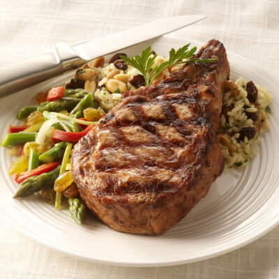 Grilled Veal Chop with Raisin-Rice Pilaf