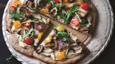 Hummus Pizza with Arugula and Wild Mushrooms