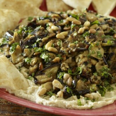 Layered Hummus and Eggplant with Roasted Garlic and Pine Nuts