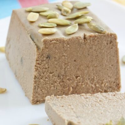 Meat paste made as small loaf with pumpkin seeds