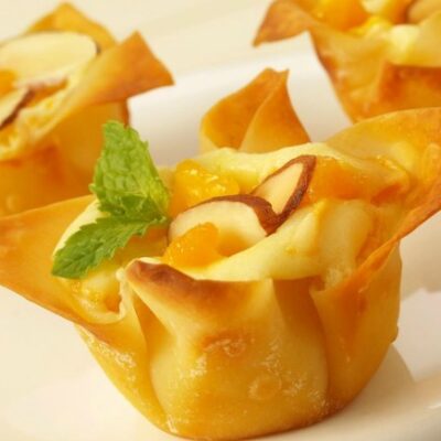 Mini Mango Amaretto Cheesecakes