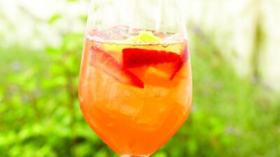 Sangria with strawberry tequila, fresh pineapple juice, and dry rose wine
