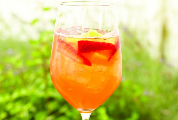 Sangria with strawberry tequila, fresh pineapple juice, and dry rose wine