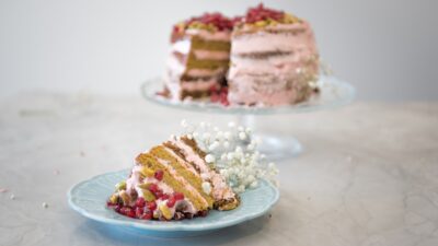 PISTACHIO CARDAMOM CAKE WITH LEMON POMEGRANATE BUTTERCREAM