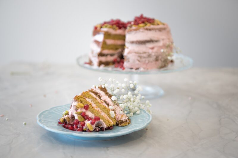 PISTACHIO CARDAMOM CAKE WITH LEMON POMEGRANATE BUTTERCREAM