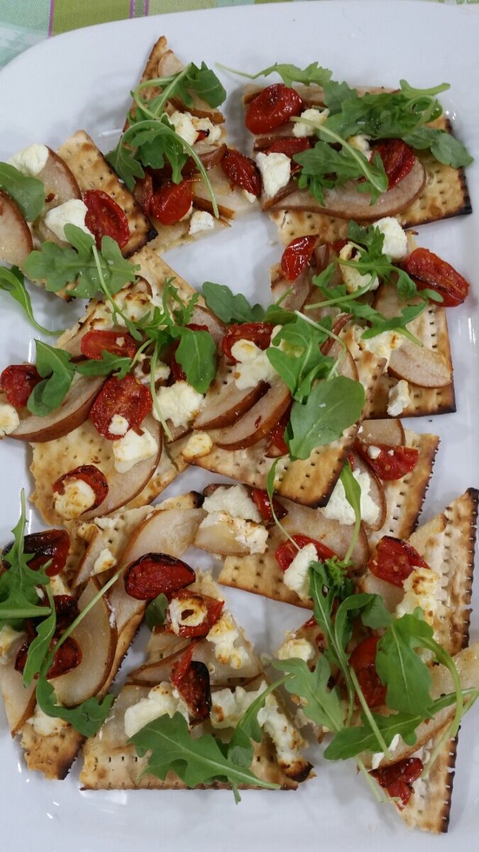 Pear, Oven Roasted Tomatoes and Goat Cheese Matzo Pizza - It's like salad on a slice of matzo, serve in pieces to make it easier to eat, could be made on a flatbread too.