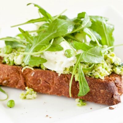 Peas with Ricotta and Mint on Grilled Crostini
