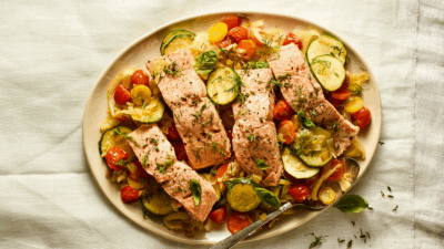 One pot fish dinner otherwise called Poached Fish with Summer Vegetable Nage