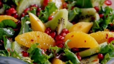 Pomegranate, Orange, Papaya, and Kiwi Green Salad