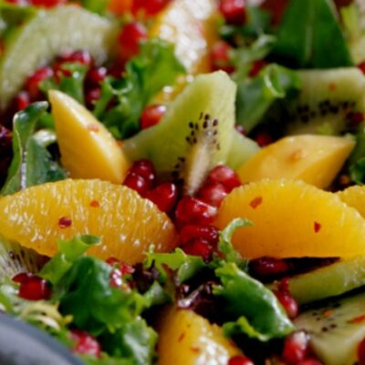 Pomegranate, Orange, Papaya, and Kiwi Green Salad