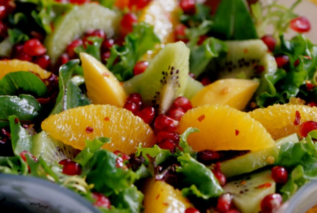 Pomegranate, Orange, Papaya, and Kiwi Green Salad