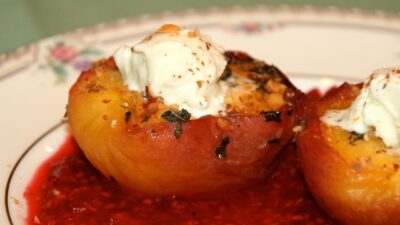 Roasted Peaches with Mint and Raspberry Sauce