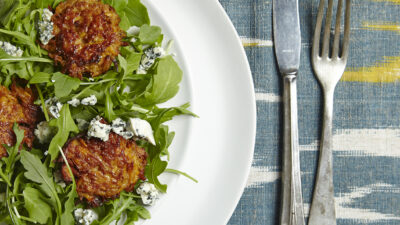 SWEET POTATO LATKE, ARUGULA, AND BLUE CHEESE SALAD WITH HONEY VINAIGRETTE