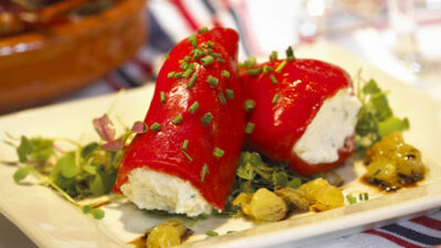 Warm Piquillo Peppers with Goat Cheese, California Raisins and Moscatel Vinaigrette