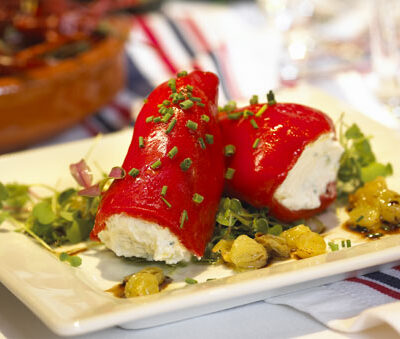 Warm Piquillo Peppers with Goat Cheese, California Raisins and Moscatel Vinaigrette