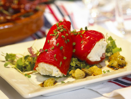 Warm Piquillo Peppers with Goat Cheese, California Raisins and Moscatel Vinaigrette